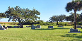 Cemetery grounds with above the ground headstones  at Aycock Funeral Home.