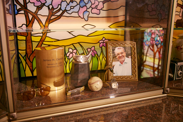 Glass niches display personal effects inside a private mausoleum at Valley Oaks