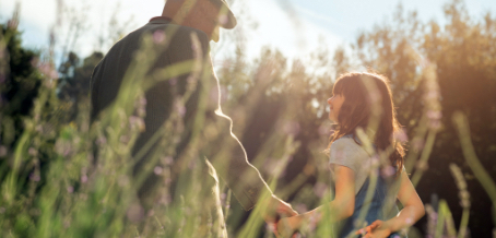 A couple sitting on a bench