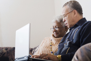 senior couple on laptop