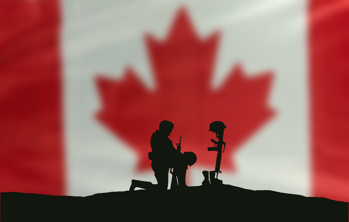 Remembrance Day soldier with Canadian flag
