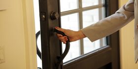A funeral director opens door to welcome families