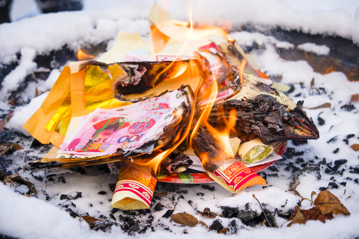 Burning Joss Paper for Chinese Funerals