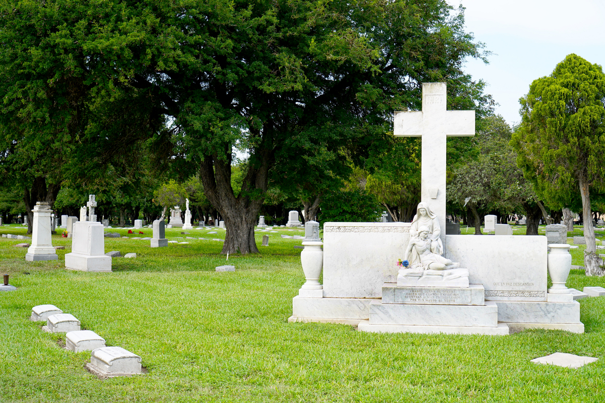cemetery grounds with cross statue at buena vista burial park.