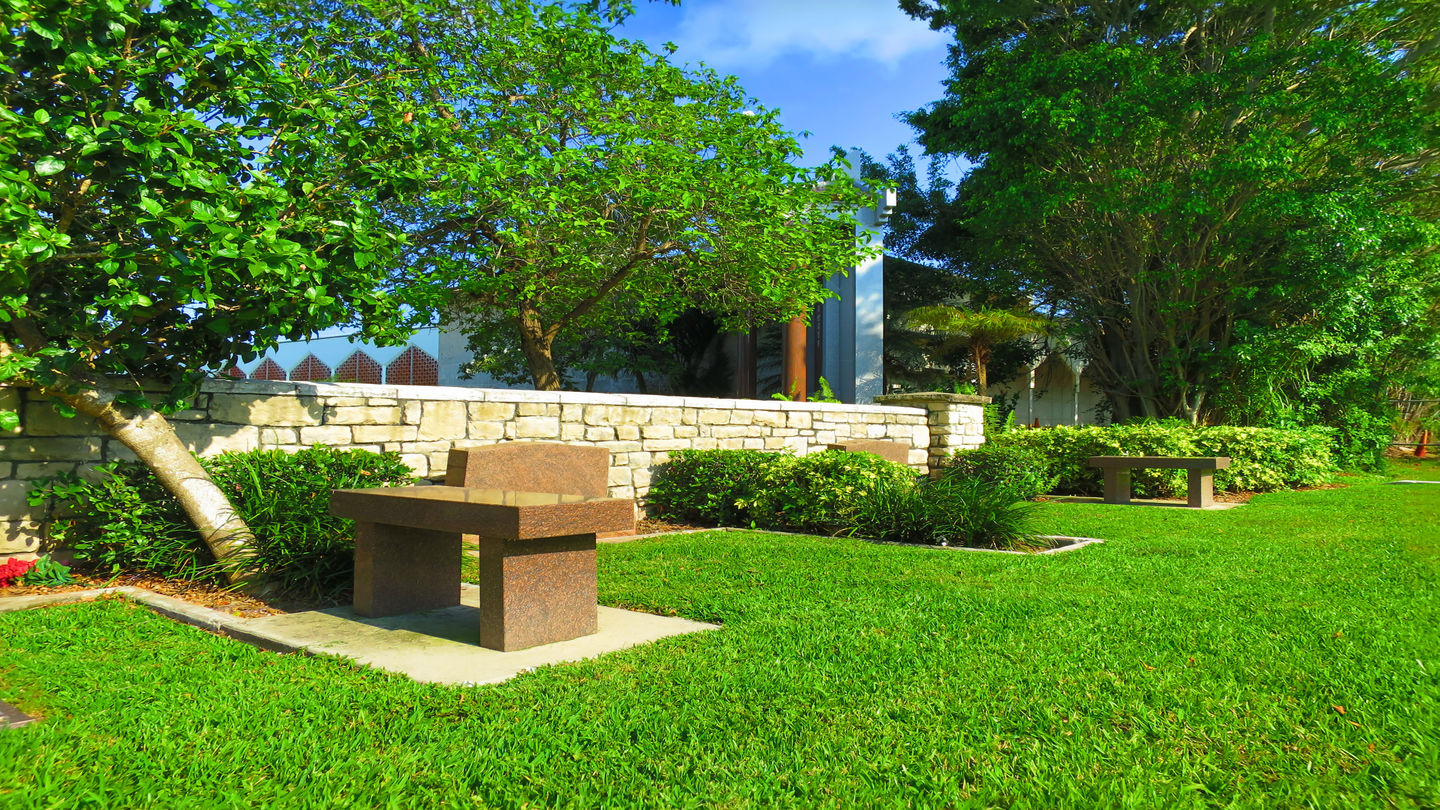 Estate area with mausoleum in the background at Forest Lawn Memorial Gardens.
