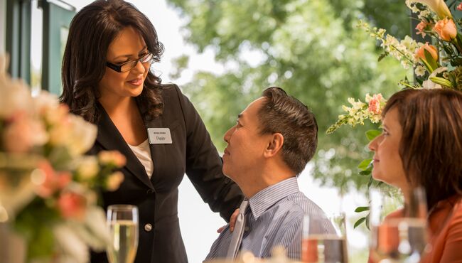 An associate provides professional and attentive service during a personalized Celebration of Life.