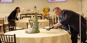 Dignity Memorial associates prepare a modern venue for an upcoming service