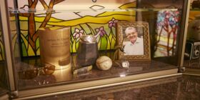 Glass niches display personal effects inside a private mausoleum at Valley Oaks