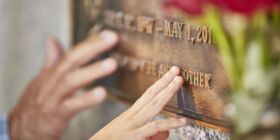 A bronze marker commemorates the life of a loved one and serves as a place to gather and remember for generations to come.  