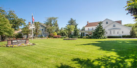 Front exterior building and signage at Becker Funeral Home