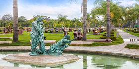 Water feature with a bronze statue Westminster Memorial Park. 