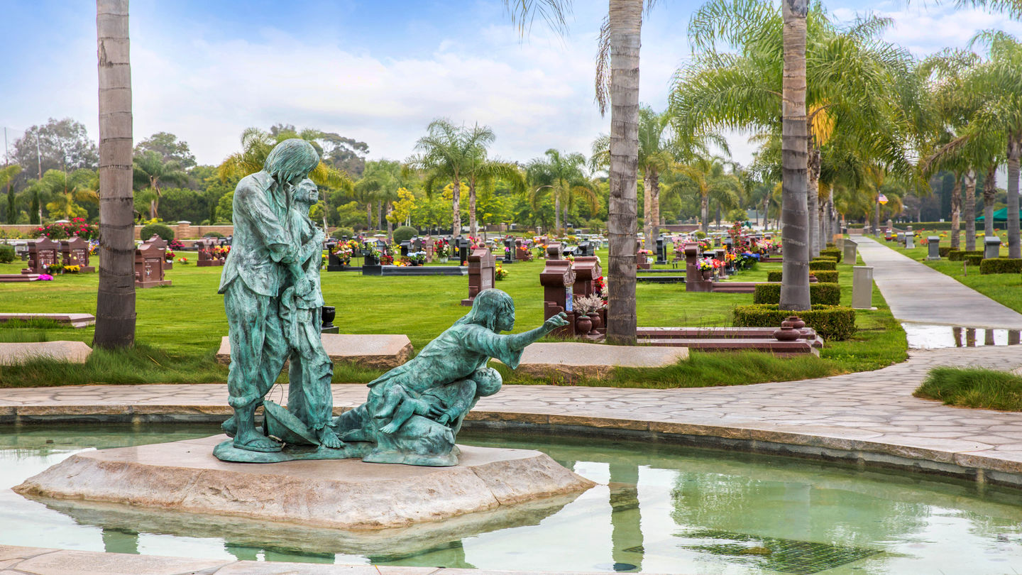 Water feature with a bronze statue in Westminster Memorial Park
